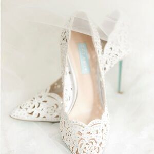 Betsey Johnson Elsa White Cutout Heels with Blue Soles